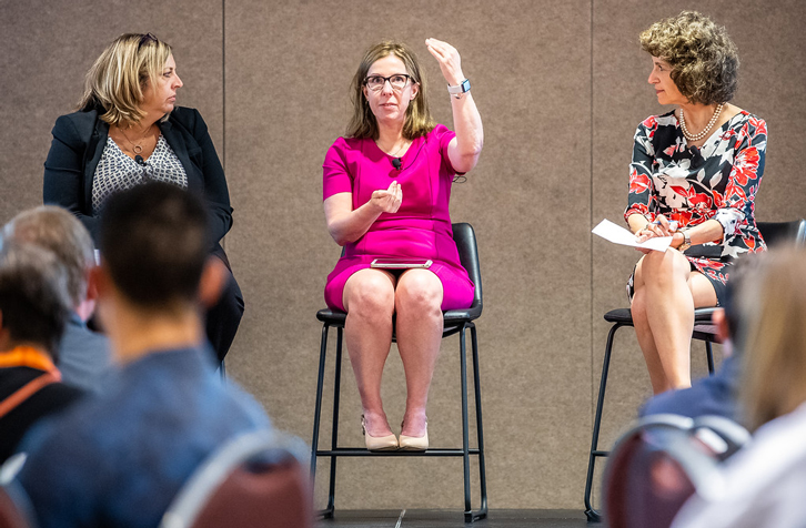 From left: Kim Gauthier, of HotelAVE; Diane Fox, of CHMWarnick; and Cindy Estis Green, of Kalibri Labs; talk during the 2019 HSMAI Revenue Optimization Conference. (Photo: Joe Szurszewski)